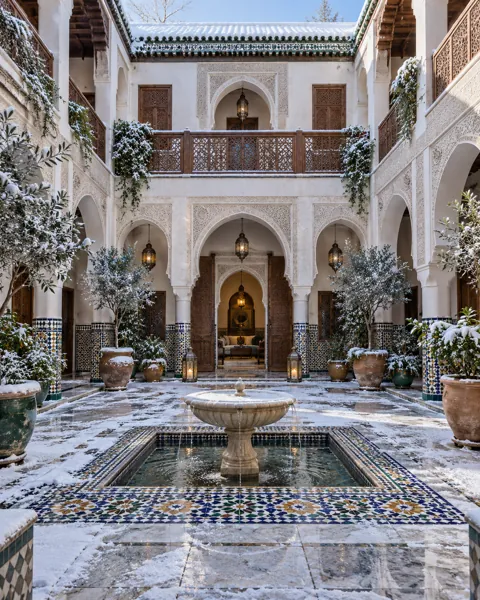 Moroccan Riad Courtyard · Winter First Snow